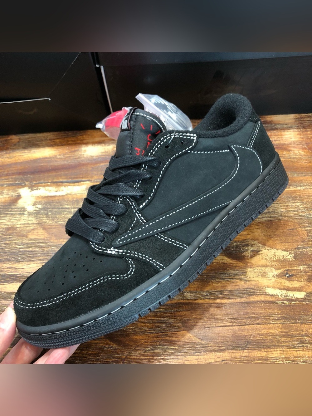 Air Jordan 1 Low OG TS Black Reverse Swoosh Collector Sneakers